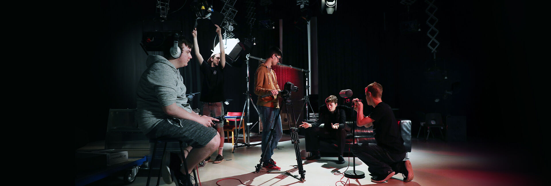 Teenagers making a film on a professional film set Teenagers making a film on a professional film set