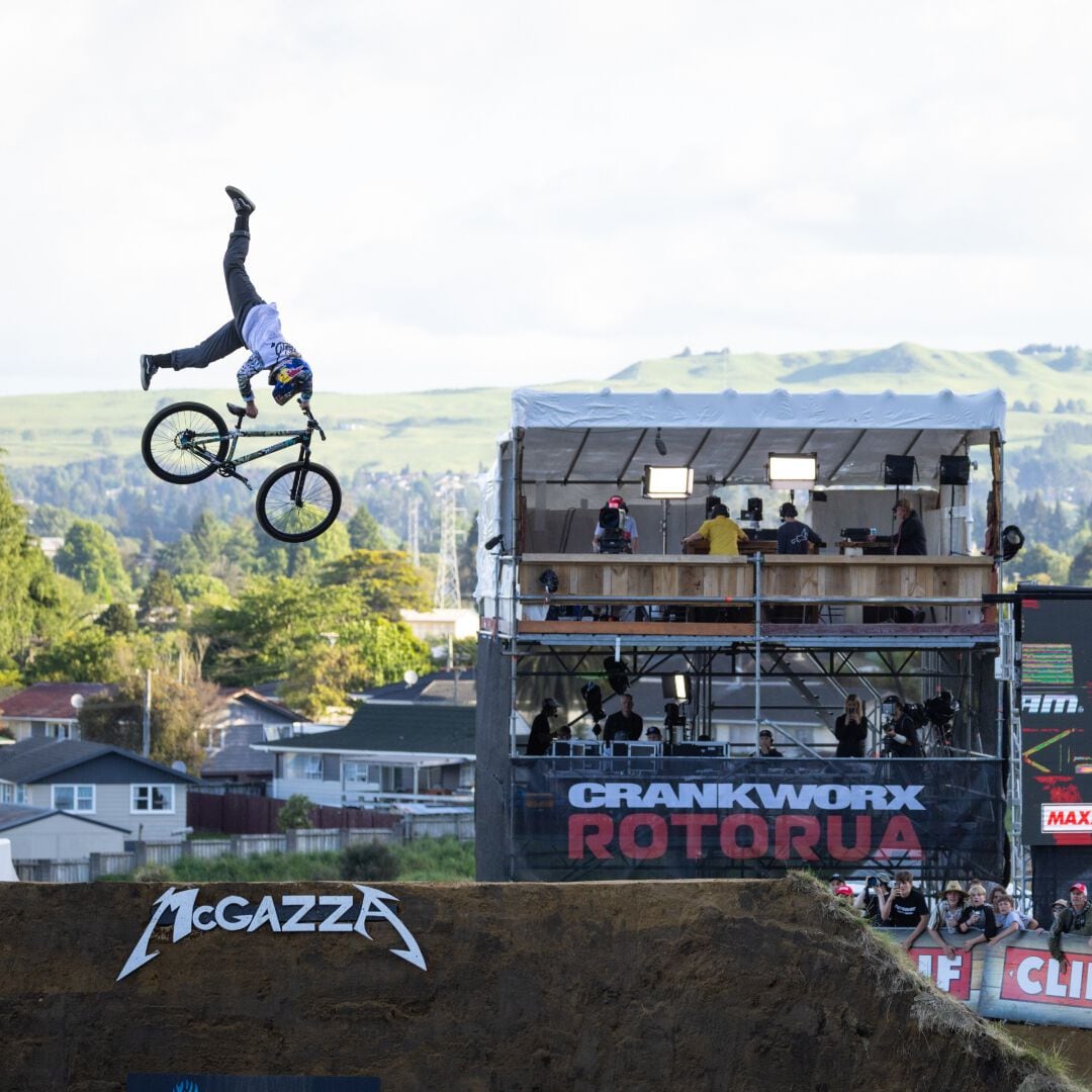 Erik Fedko jumping in the air on his mountain bike at Crankworx Rotorua